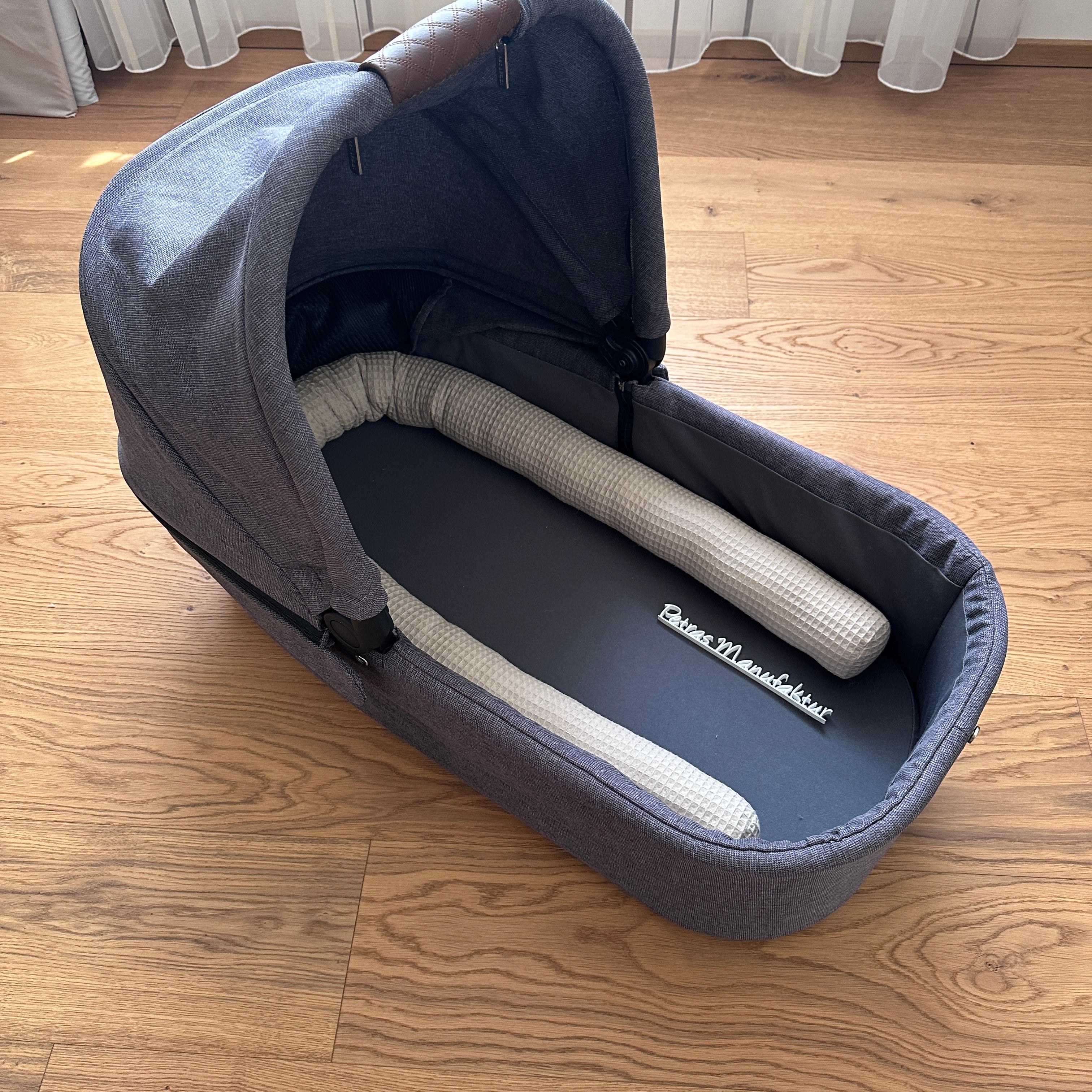 Rolle/Schlange für den Kinderwagen